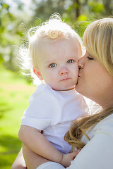 Image showing Young Mother Holding Her Adorable Baby Boy