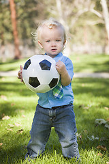 Image showing Young Cute Boy Playing with Soccer Ball in Park