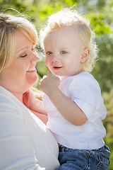 Image showing Young Mother Holding Her Adorable Baby Boy