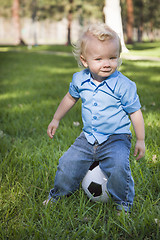 Image showing Young Cute Boy Playing with Soccer Ball in Park