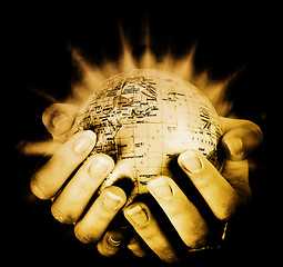 Image showing Globe in a girl's hands