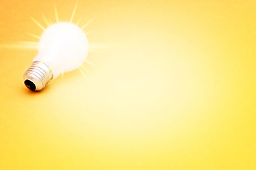 Image showing Background with lit lightbulb