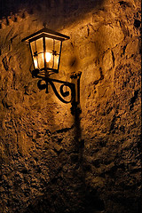 Image showing street lamp a bulb in the   wall fussen 