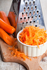 Image showing metal grater and carrot