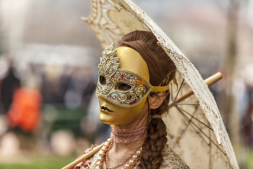 Image showing Disguised Person with a Parasol