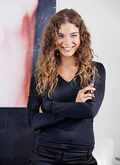 Image showing Confident Female Hairdresser With Arms Crossed