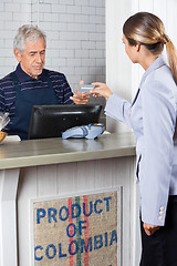 Image showing Customer Making Payment By Credit Card