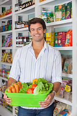 Image showing Man With Vegetable Basket In Supermarket