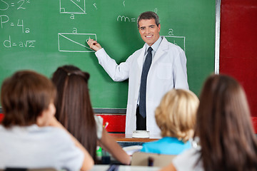 Image showing Teacher Teaching Schoolchildren