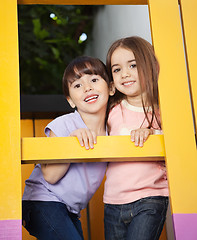 Image showing Girl With Friend Playing In Playhouse