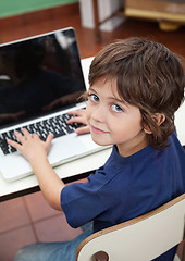 Image showing Little Boy With Laptop In Preschool