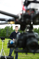 Image showing UAV Flying With Focus On Technician