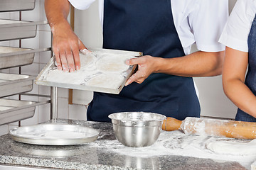 Image showing Chefs Working In Restaurant Kitchen