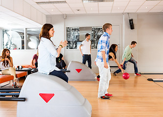 Image showing Young Friends Bowling in Club