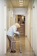 Image showing Elderly Woman Standing In Passageway