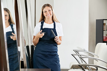 Image showing Beautiful Female Hairdresser In Salon