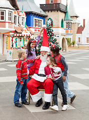Image showing Happy Children And Santa Claus