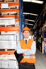 Image showing Male Supervisor With Arms Crossed At Warehouse