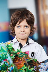 Image showing Little Boy With Craft In Kindergarten