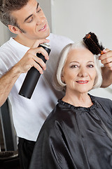 Image showing Woman Getting Her Hair Styled