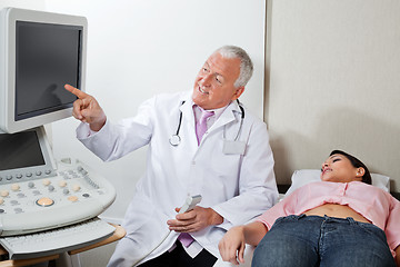 Image showing Radiologist With Female Patient At Clinic