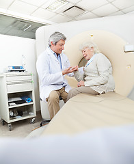 Image showing Radiologist Comforting Female Patient