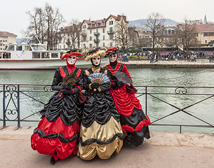 Image showing Three Disguised Persons