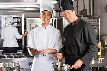 Image showing Happy Chefs Cooking Together
