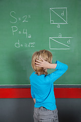 Image showing Confused Little Boy Looking At Board