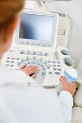 Image showing Doctor Holding Ultrasound Equipment