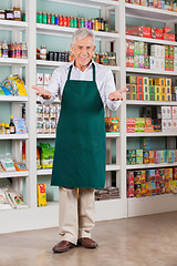 Image showing Senior Male Store Owner Welcoming In Supermarket