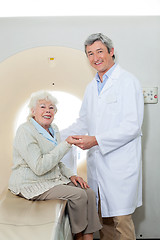 Image showing Happy Doctor And Female Patient