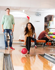 Image showing Happy Young Woman Bowling in Club