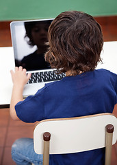 Image showing Boy Using Laptop In Kindergarten