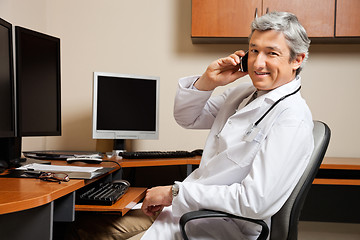 Image showing Happy Doctor On Call