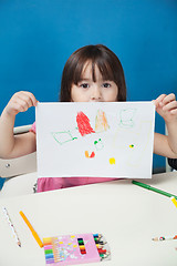 Image showing Girl Showing Drawing Paper In Classroom