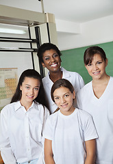 Image showing Teacher Standing With Female Students