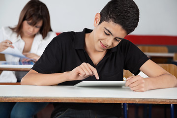 Image showing High School Student Using Digital Tablet At Desk