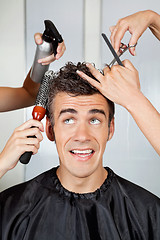 Image showing Hairdressers Setting Up Client's Hair