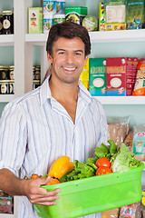 Image showing Man With Vegetable Basket In Grocery Store