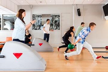 Image showing Friends Bowling Together in Club