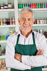 Image showing Confident Male Owner Standing In Grocery Store