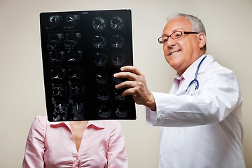 Image showing Radiologist Holding X-ray