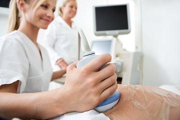 Image showing Pregnant Woman Going Through An Ultrasound Scan