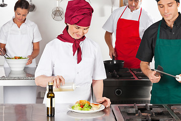 Image showing Chefs Working In Kitchen