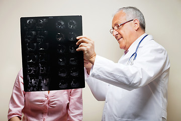 Image showing Senior Radiologist Holding X-ray