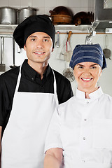 Image showing Happy Chefs In Industrial Kitchen