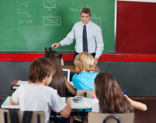 Image showing Students Using Tablet And Calculator