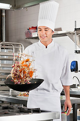 Image showing Chef Tossing Vegetables in Wok