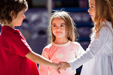 Image showing Girl Looking At Friend While Playing In Kindergarten